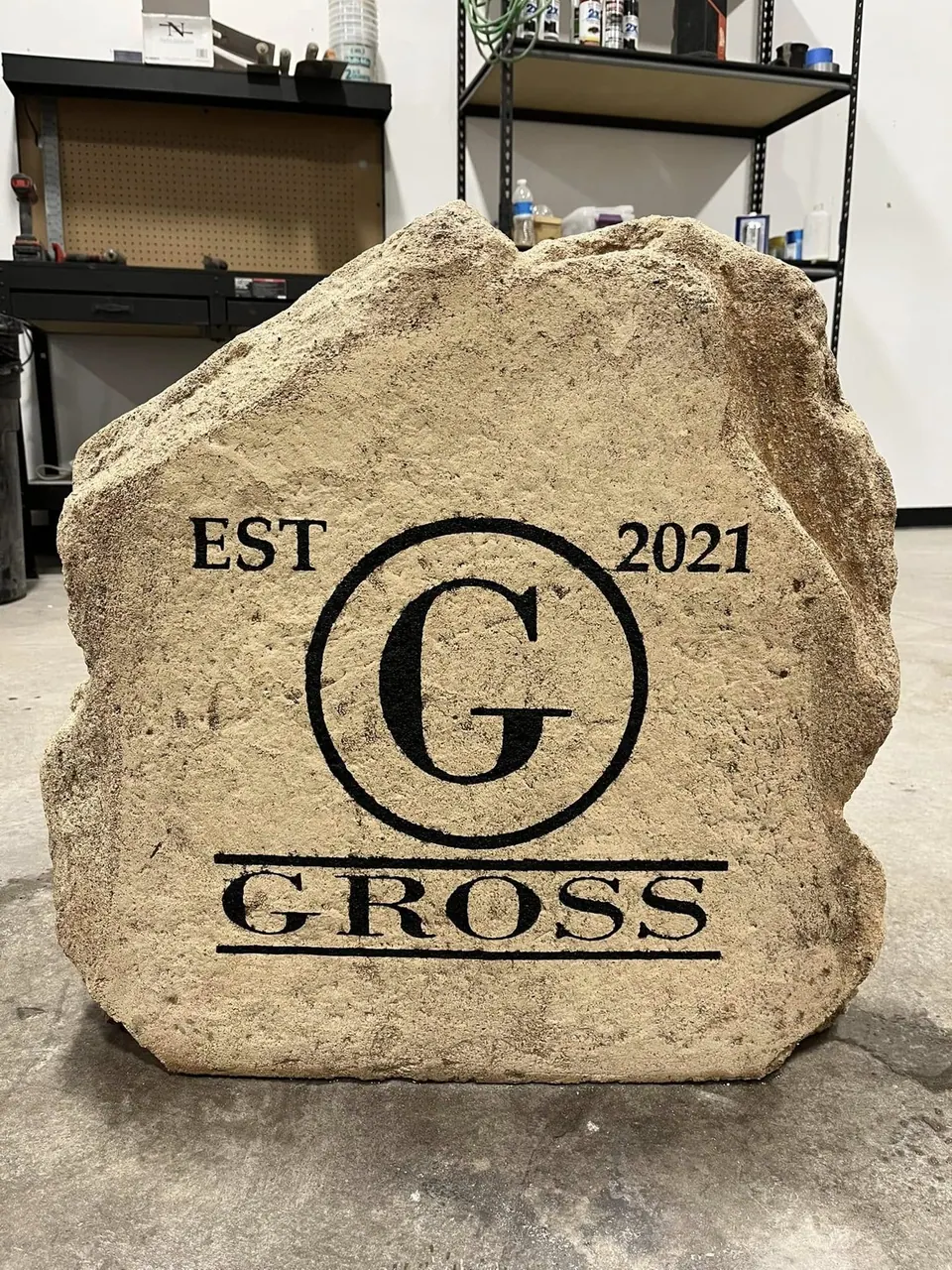 Engraved monogram boulder in the shop